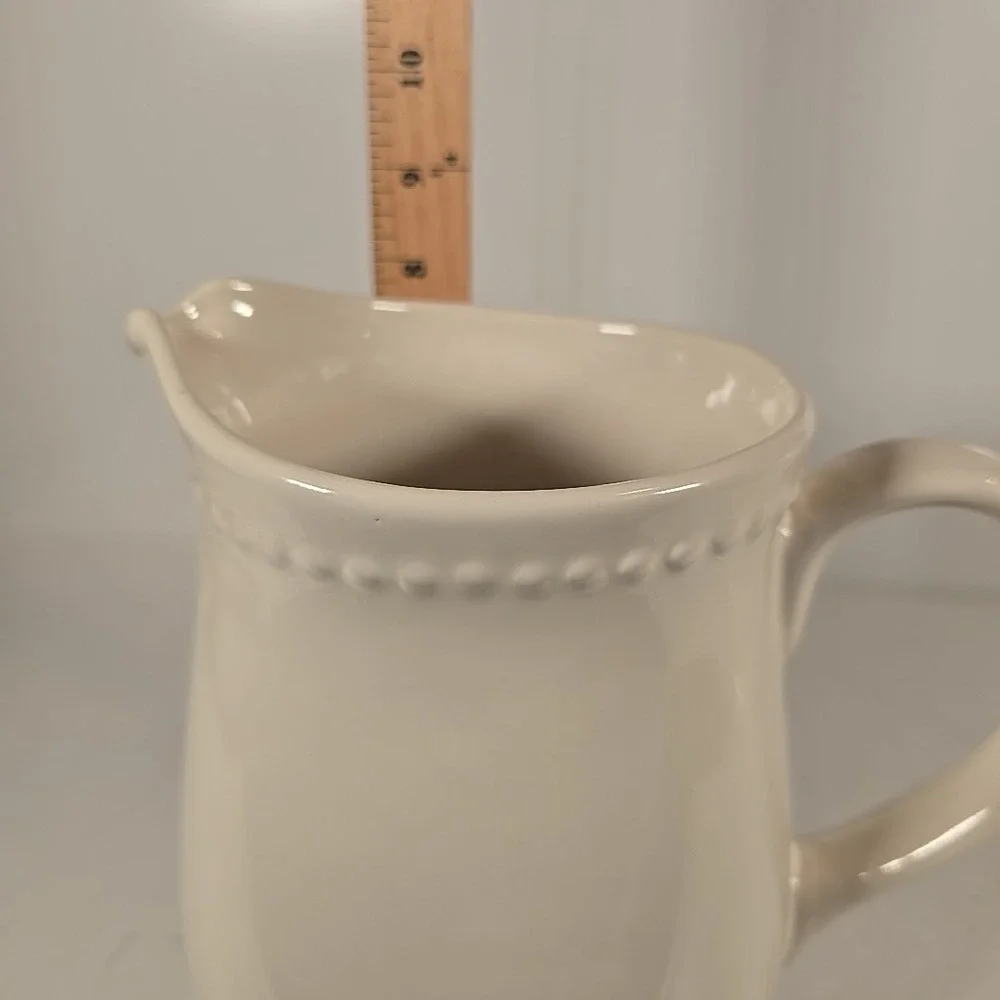 WHITE HOME CERAMIC PITCHER 7 1/2 INCHES‎ TALL
